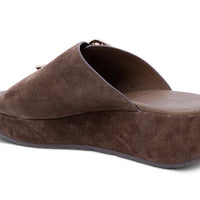 Elara dark brown suede slide sandal with crossover strap and rectangular buckle