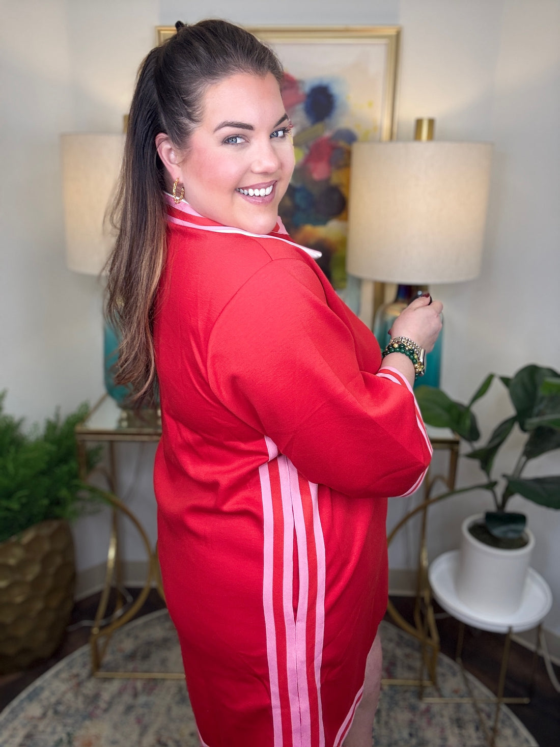 Woman wearing a red and pink dress