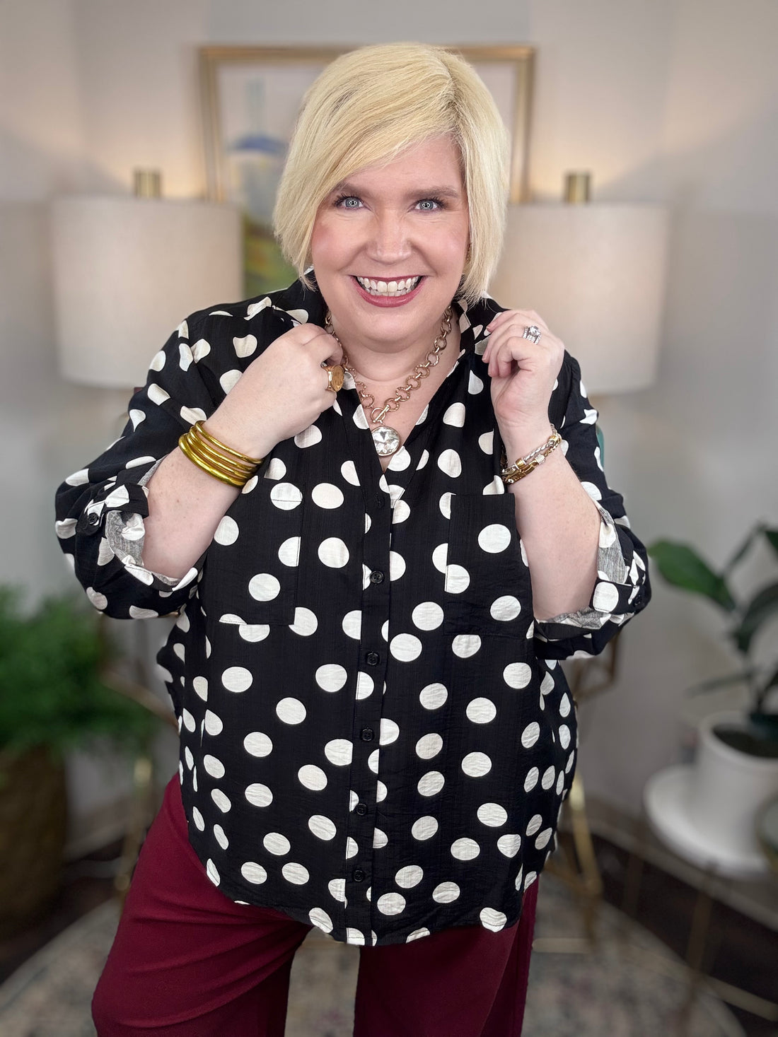 Black button down blouse with white polka dots
