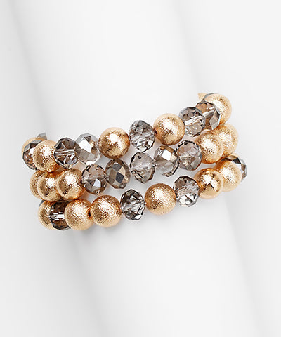 Three-row gold stretch bracelet with taupe gemstone beads