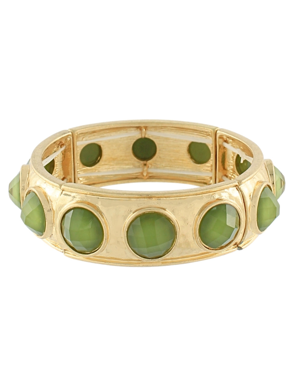 Gold stretch bracelet with faceted round green stones