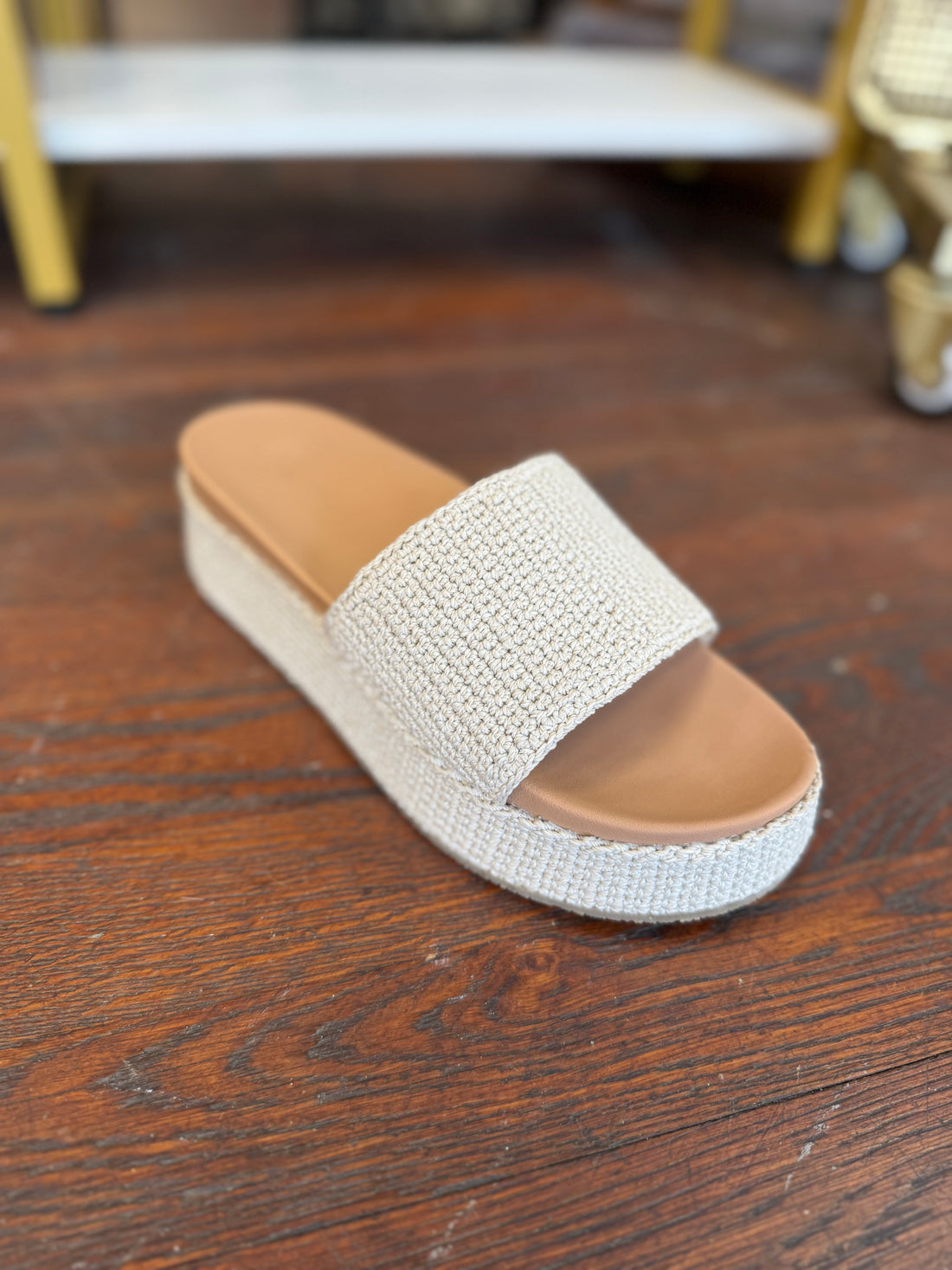 Beige sandal with brown sole