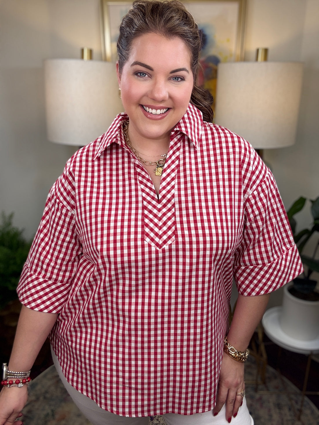 Woman wearing a red and white checkered shirt 