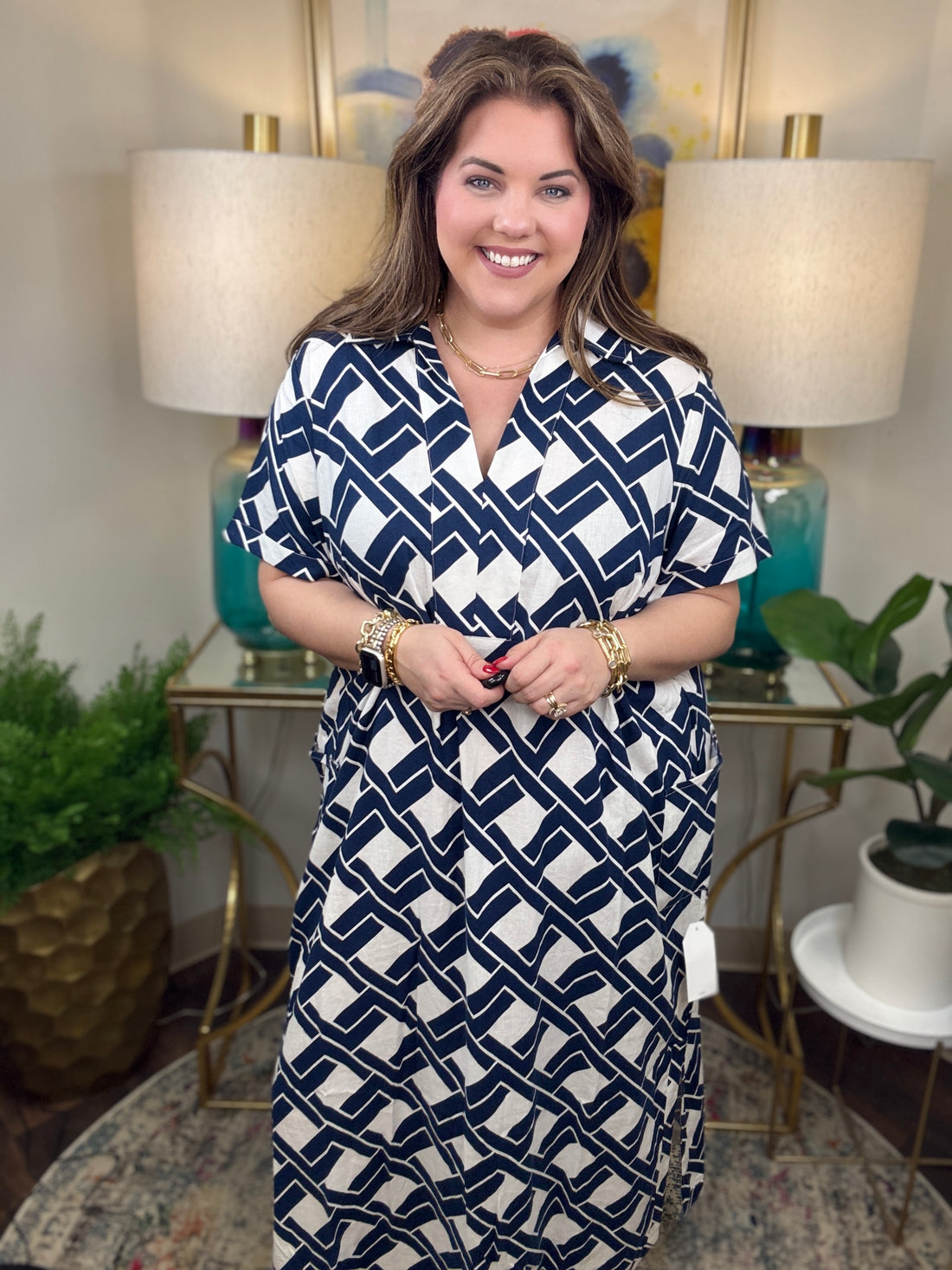 Woman wearing a navy and white patterned dress