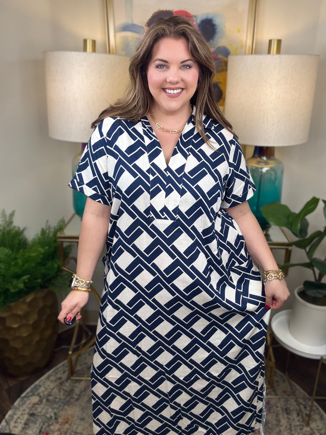 Woman wearing a navy and white patterned dress