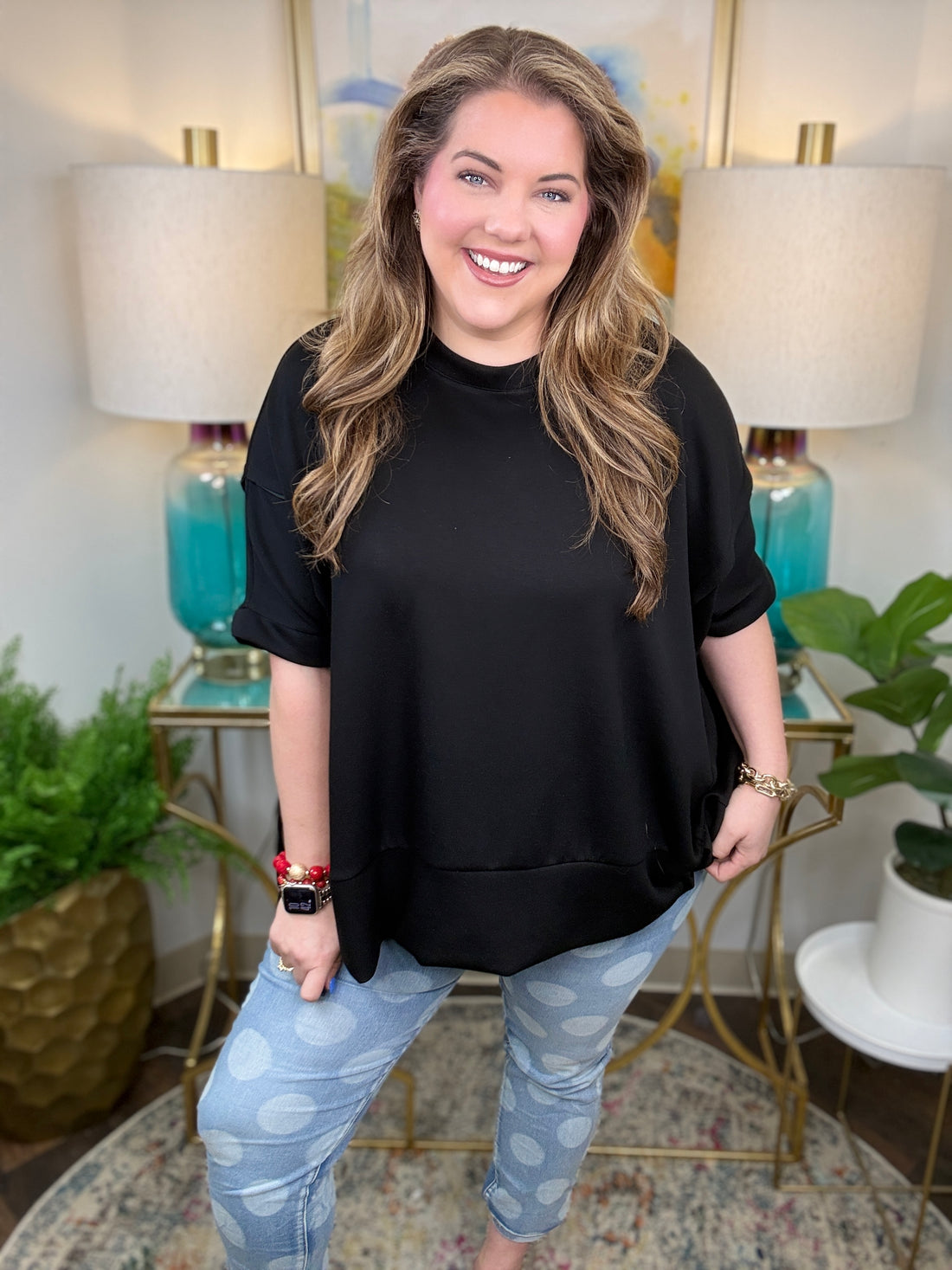 Woman wearing denim polka dot jeans 