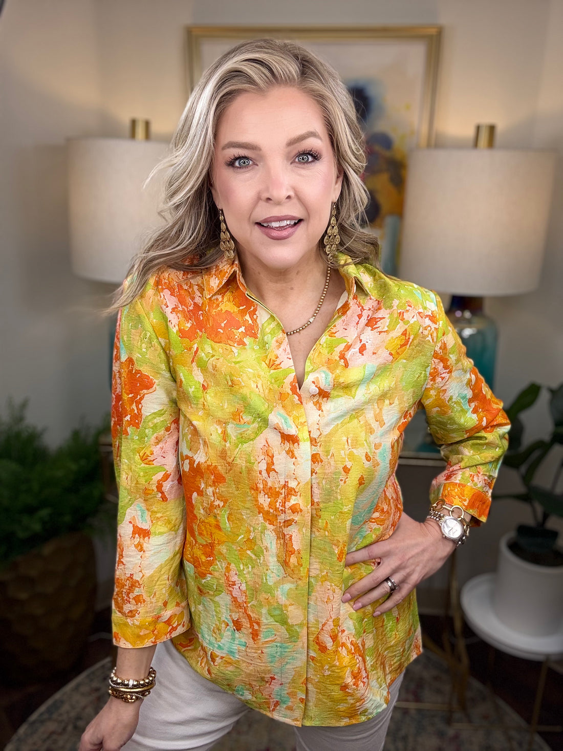 Woman wearing an orange and yellow top