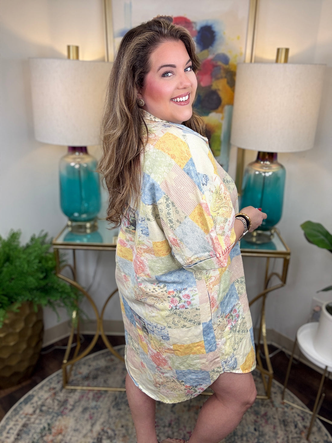 Woman wearing denim patchwork button down dress