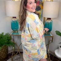 Woman wearing denim patchwork button down dress