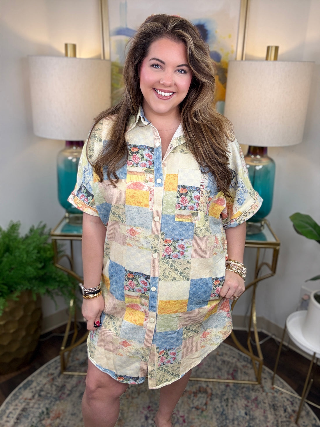 Woman wearing denim patchwork button down dress