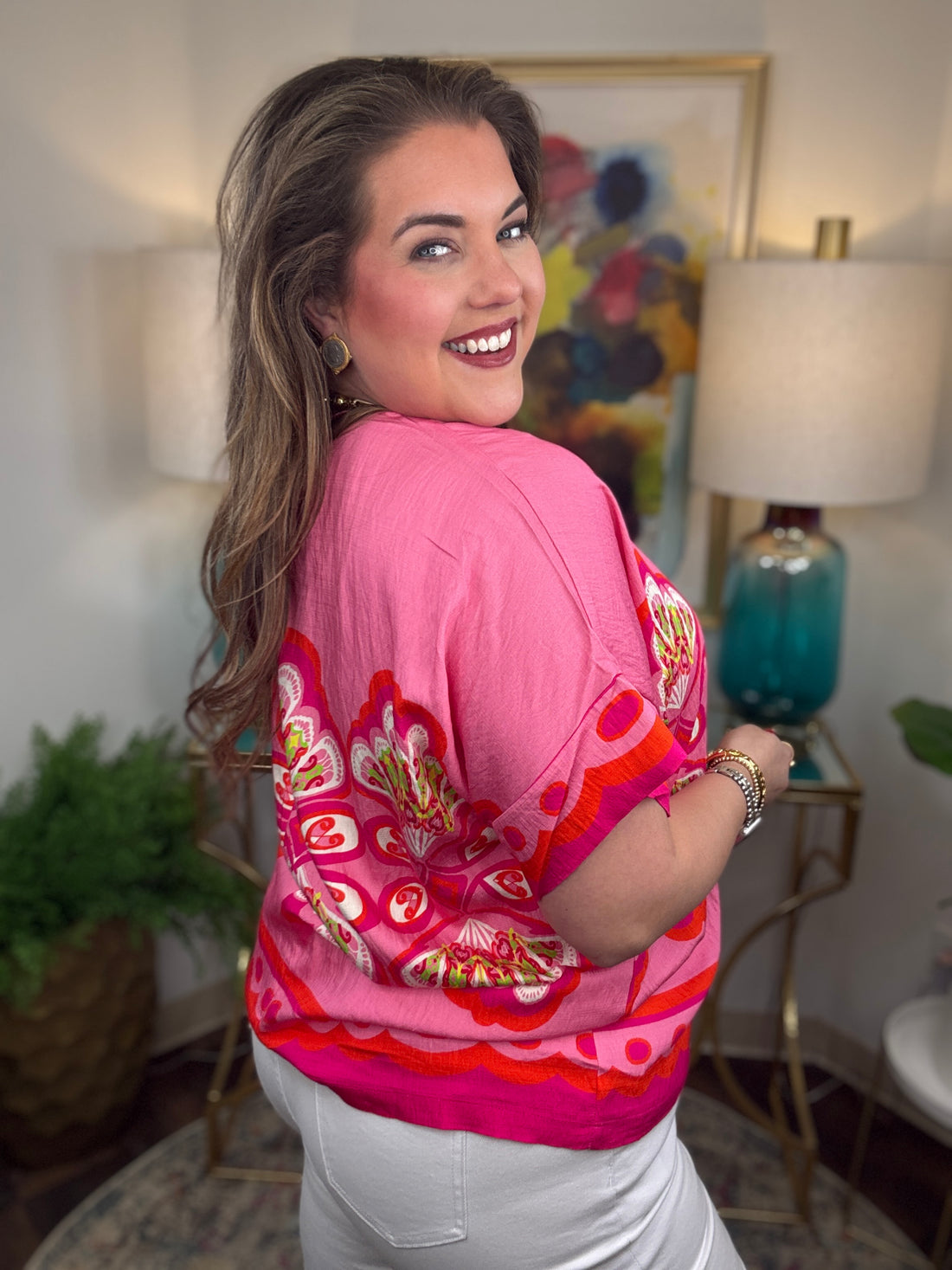Woman wearing a pink floral top