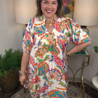 Woman wearing a colorful floral dress