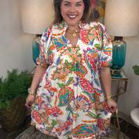 Woman wearing a colorful floral dress