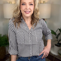 Absolute Delight Top, a classic black and white gingham button-down top with a timeless checkered pattern.