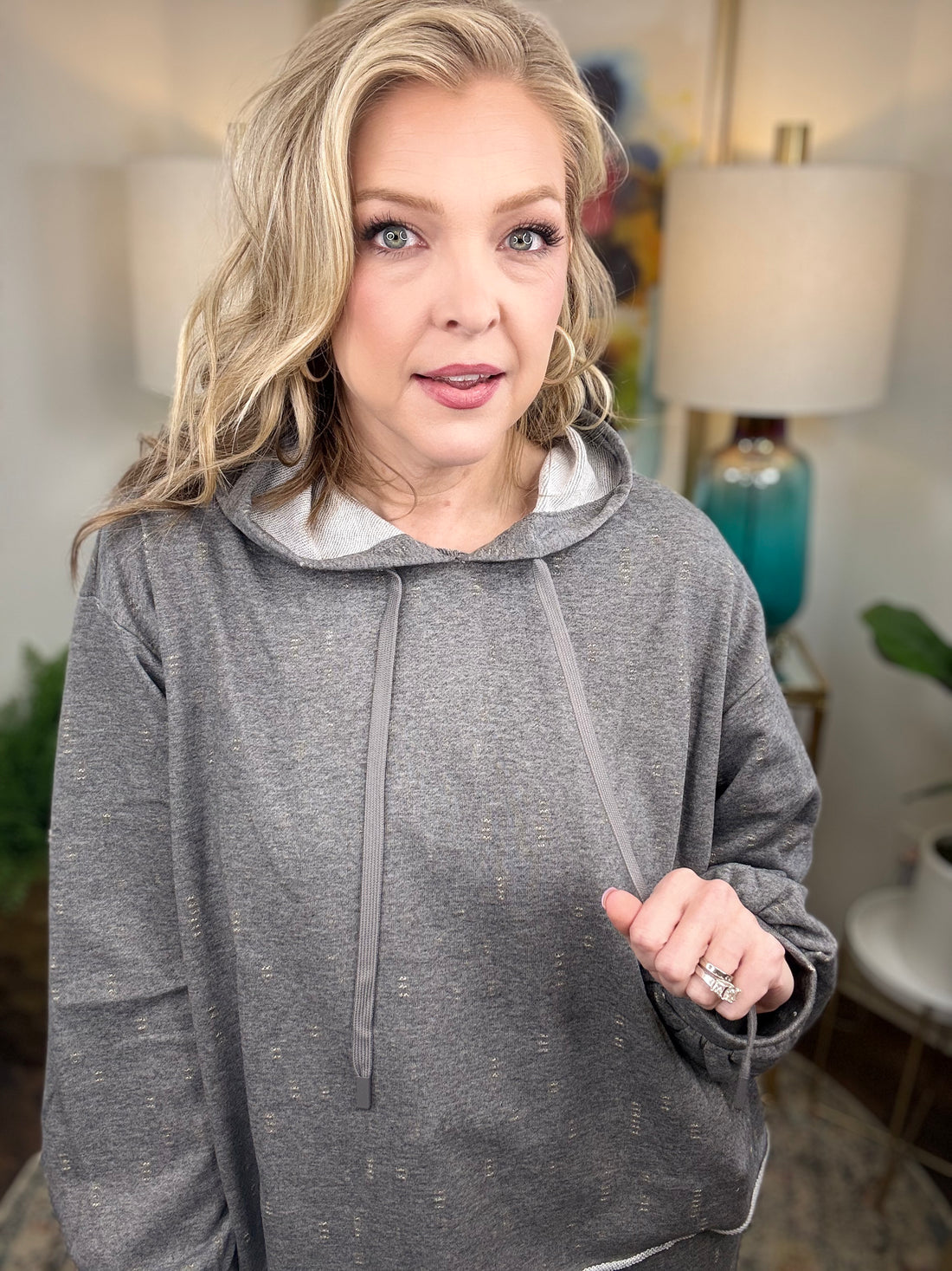 Gray lightweight hoodie with slight cropped length