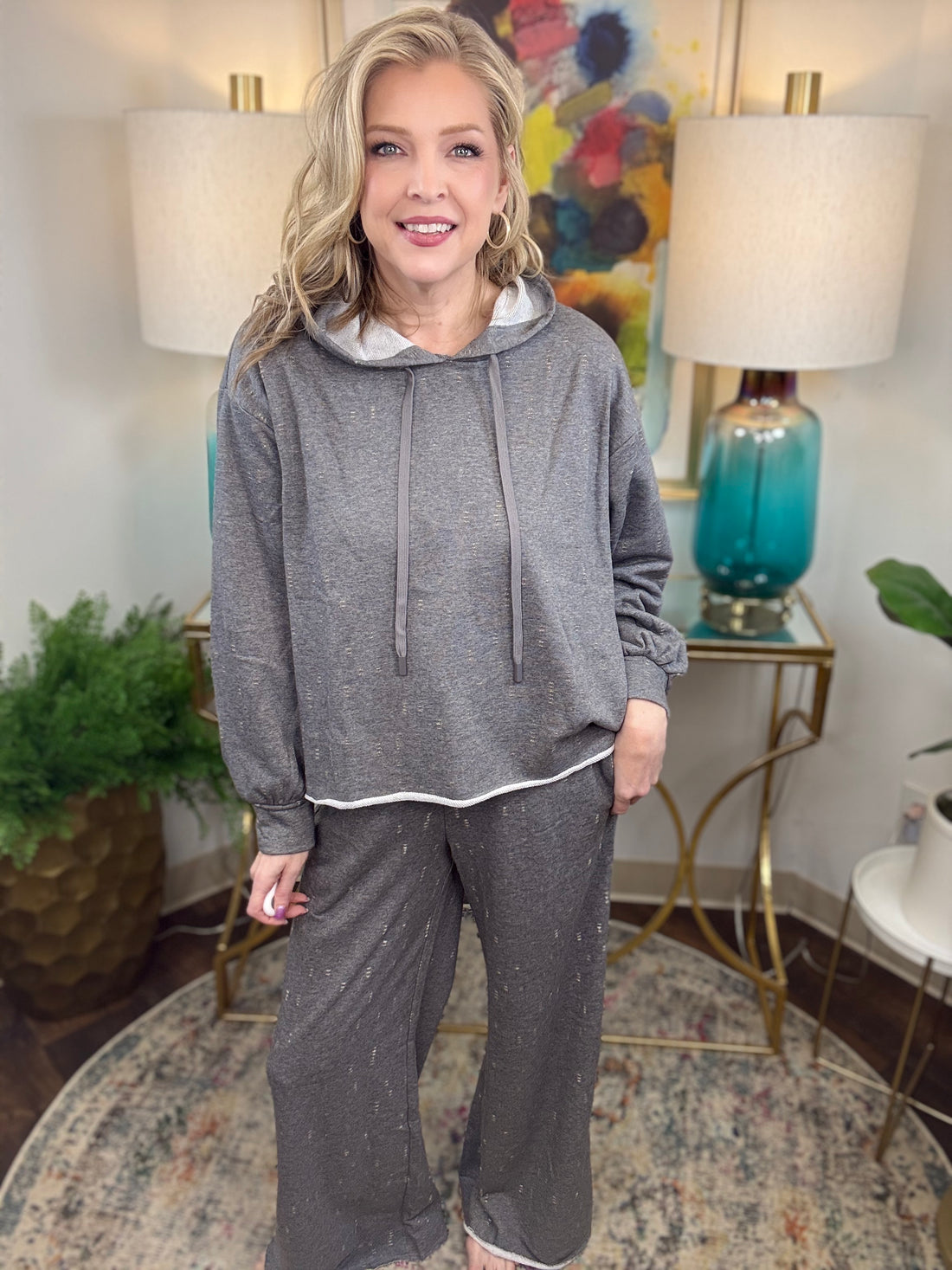 Gray lightweight lounge pants with cream and gold stitching details