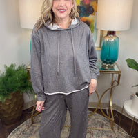 Gray lightweight lounge pants with cream and gold stitching details