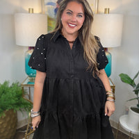 Women's faux suede button down dress available in black and crimson