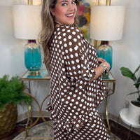 matching brown and white polka dot lounge set, featuring a short-sleeve V-neck top and wide-leg pants with ruffle hems