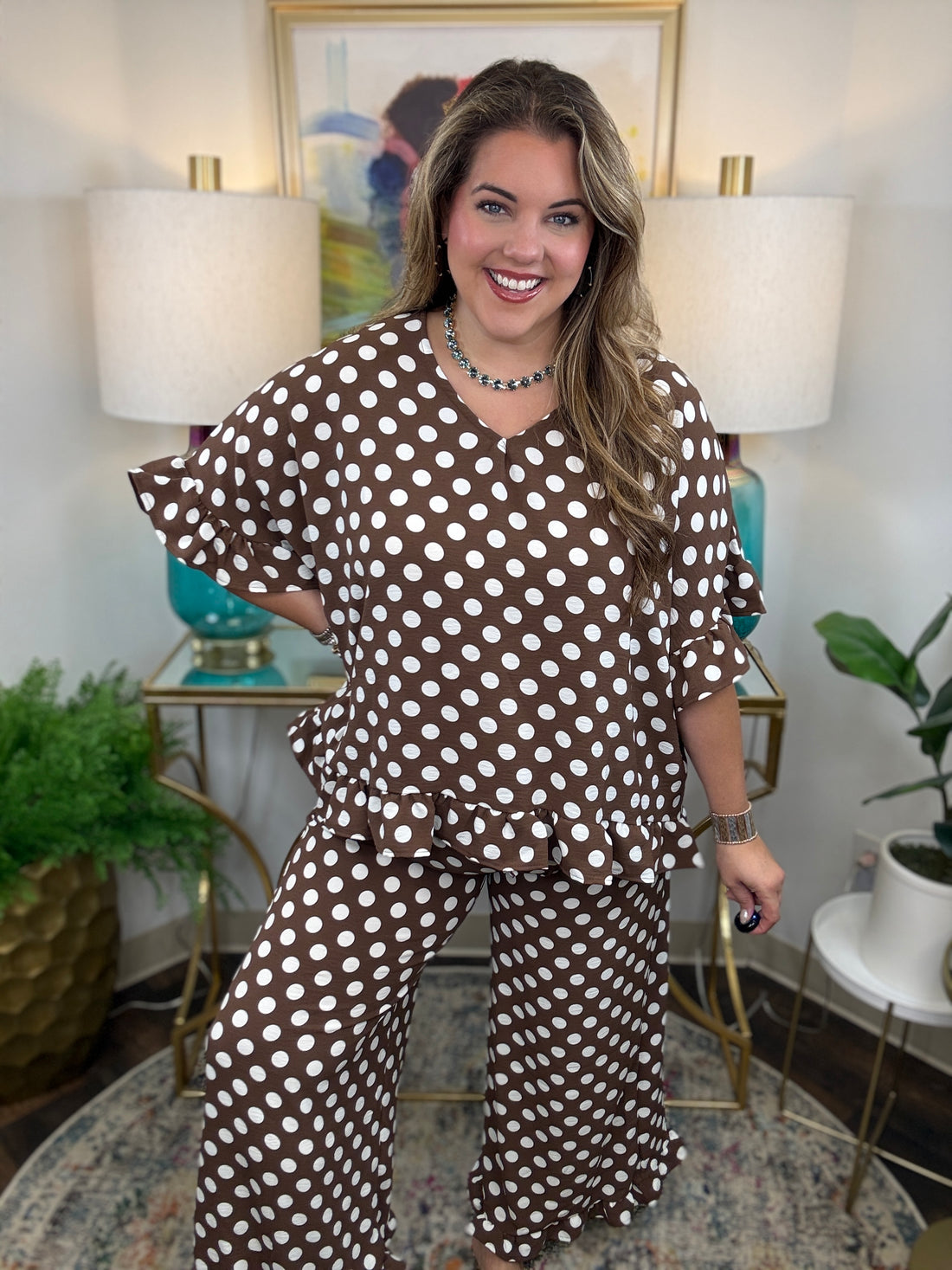 matching brown and white polka dot lounge set, featuring a short-sleeve V-neck top and wide-leg pants with ruffle hems