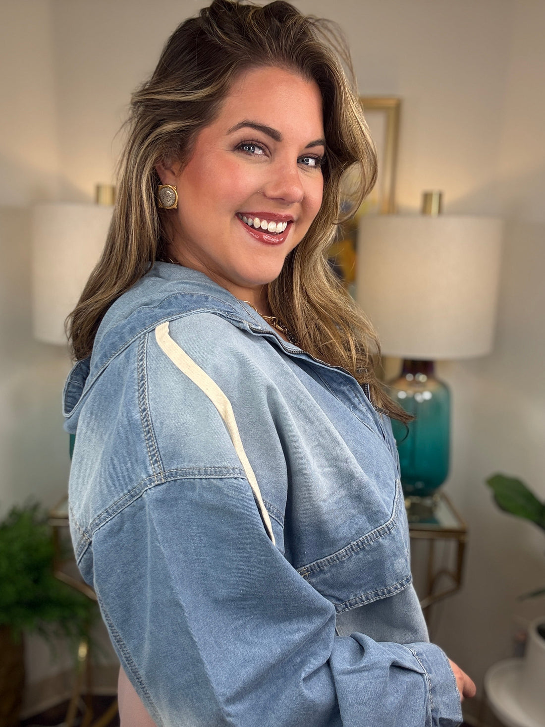 Oversized denim hooded pullover with zipper neckline