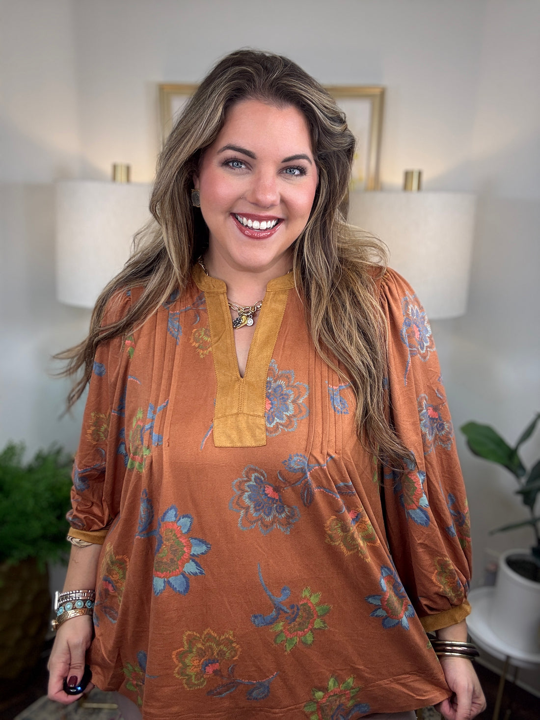 Flowing faux suede fall floral top in warm autumn colors