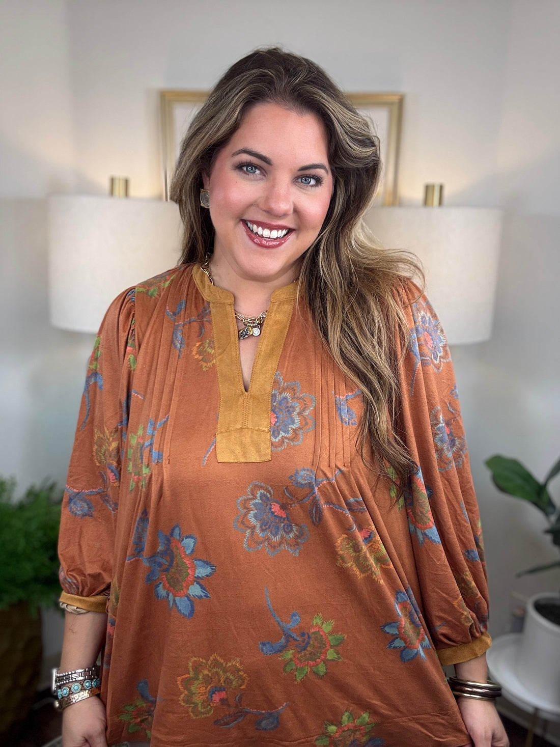 Flowing faux suede fall floral top in warm autumn colors