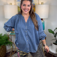 Curvy denim button down top with V-neck and balloon sleeves