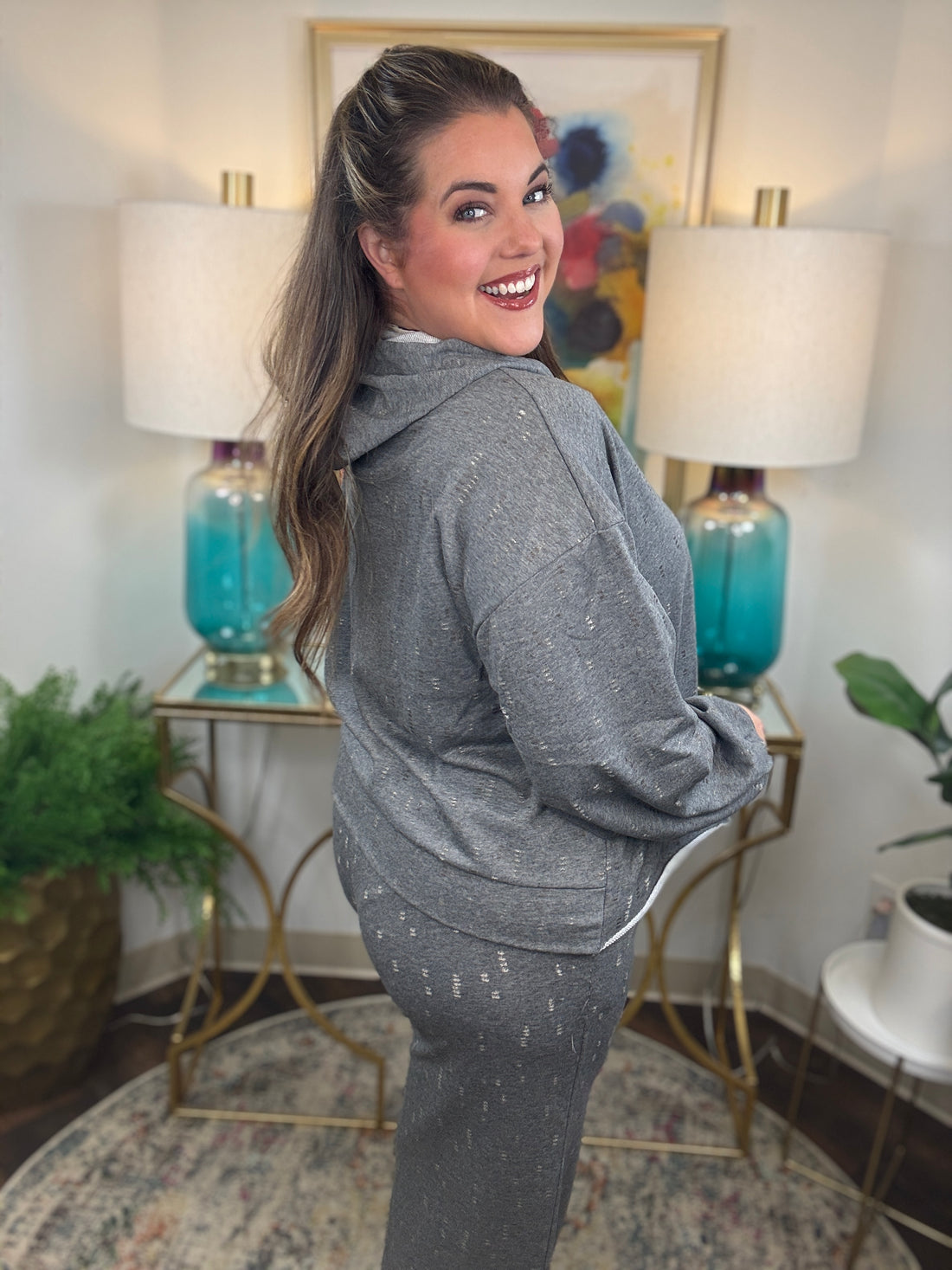 Gray lightweight lounge pants with cream and gold stitching details