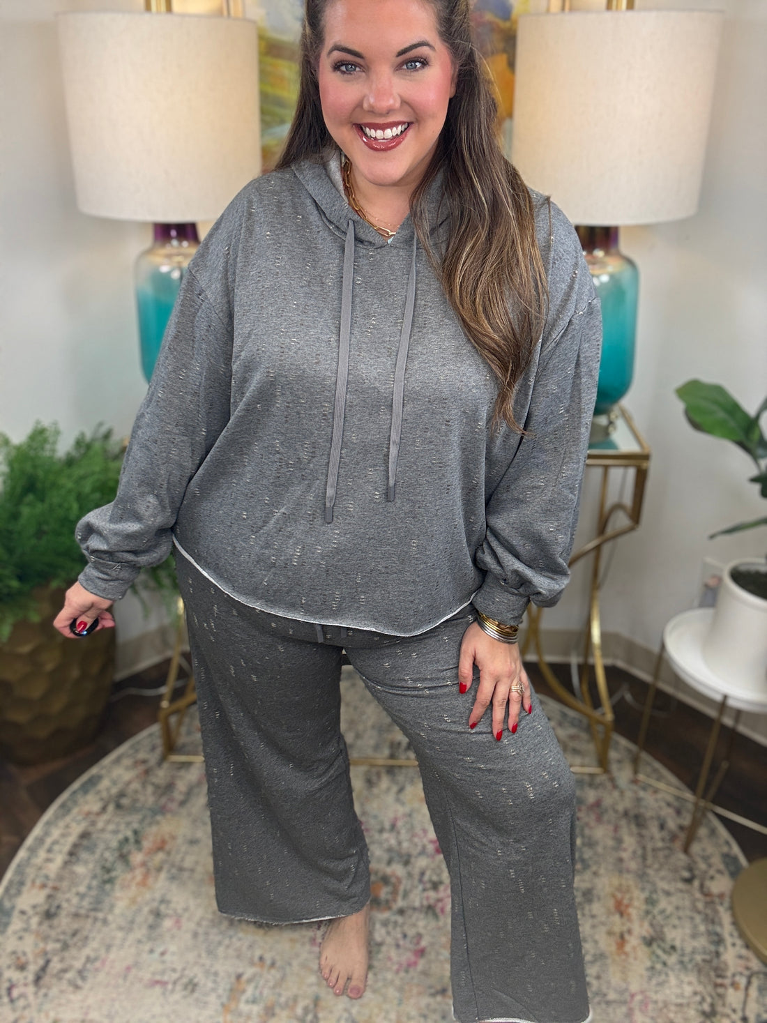 Gray lightweight lounge pants with cream and gold stitching details