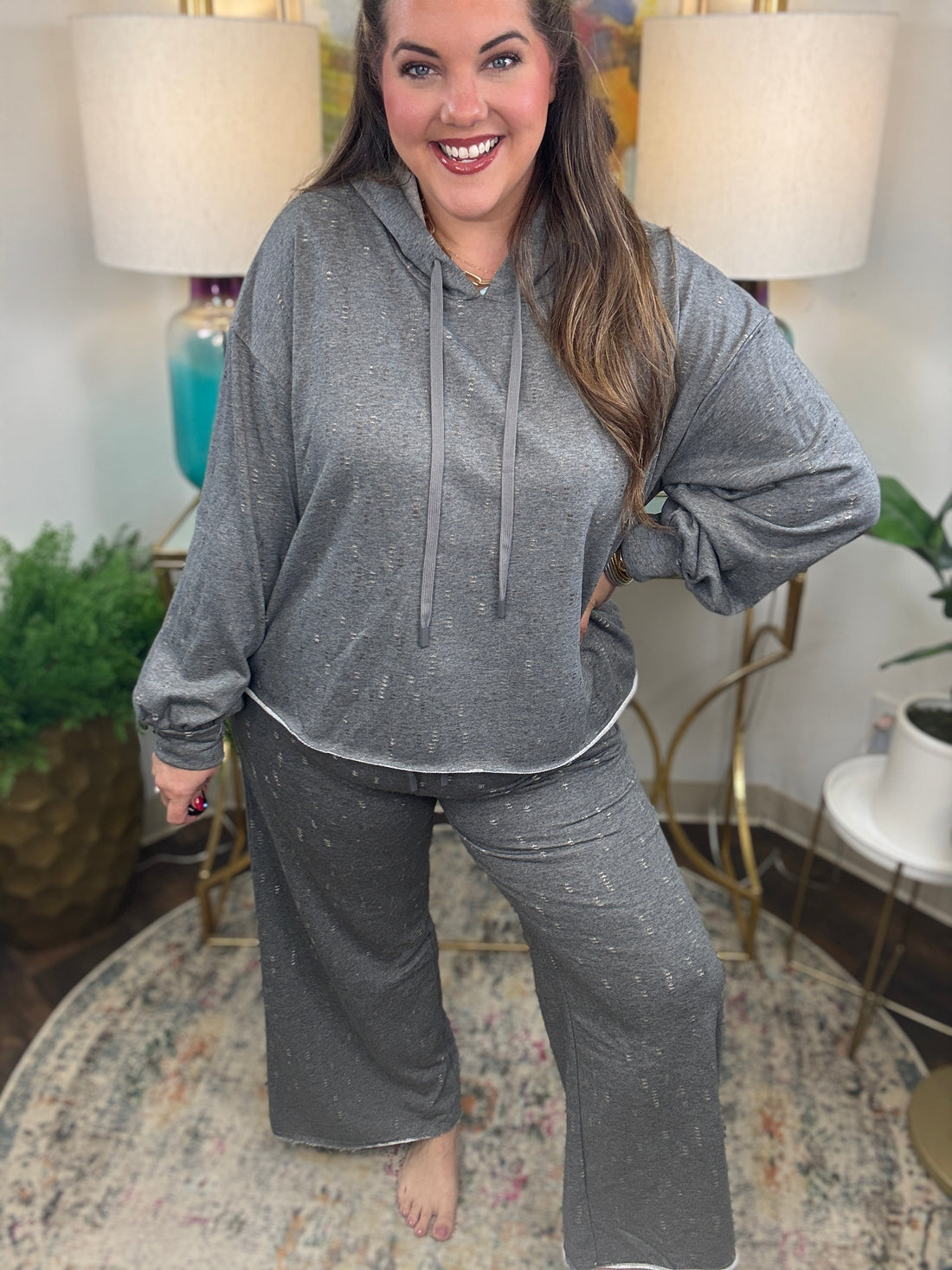 Gray lightweight lounge pants with cream and gold stitching details