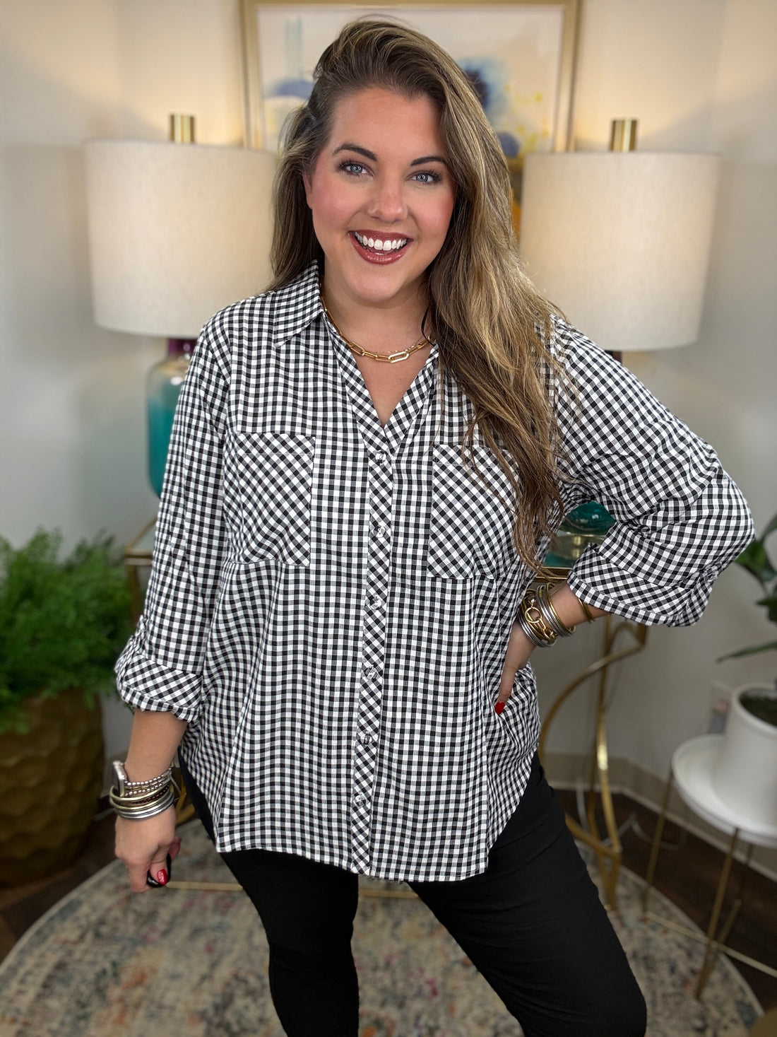 Absolute Delight Top, a classic black and white gingham button-down top with a timeless checkered pattern.