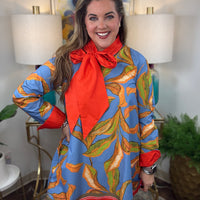 Women's long-sleeve floral mini dress in blue, orange and green