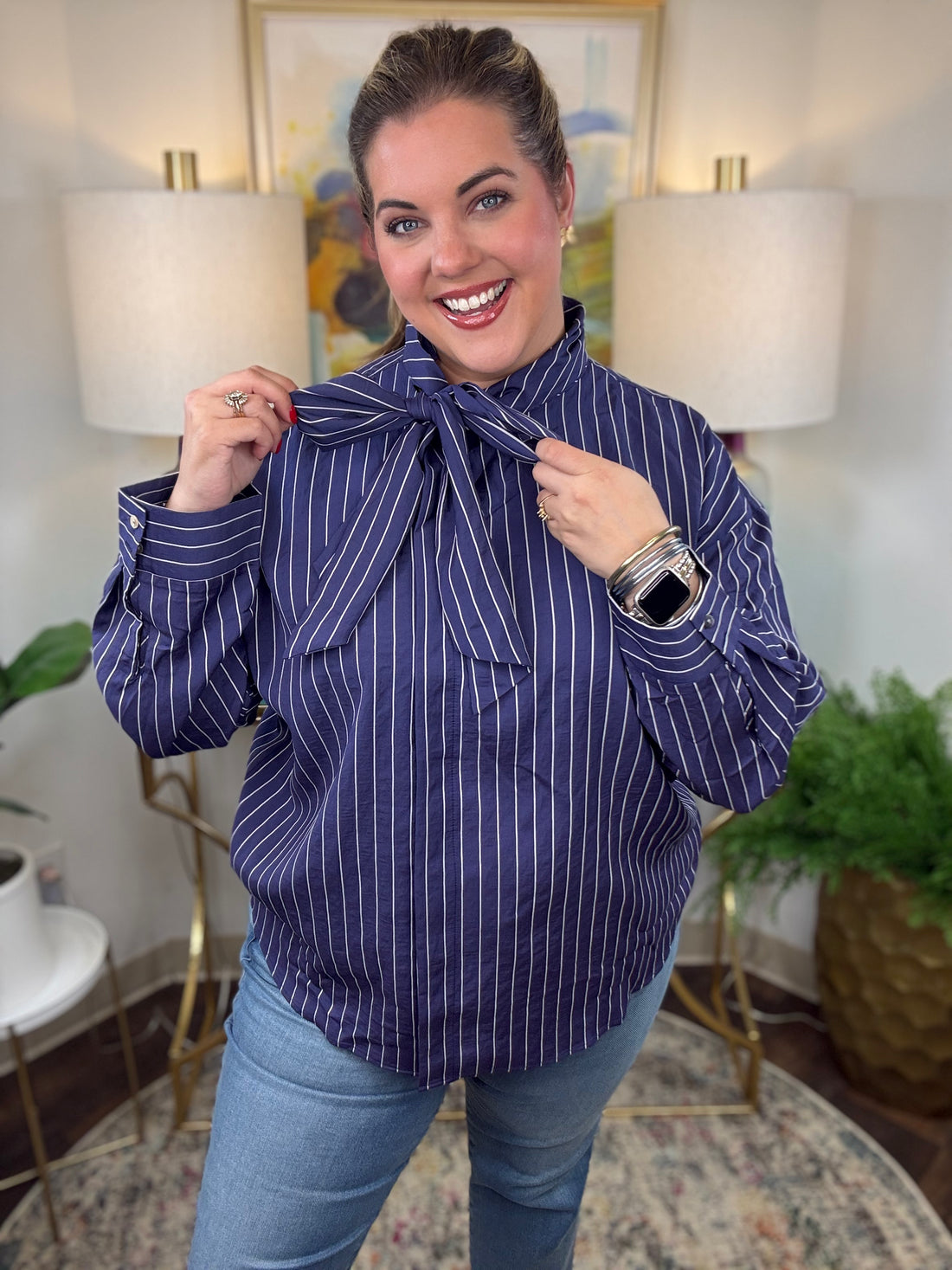 Navy pinstripe blouse with side bow tie