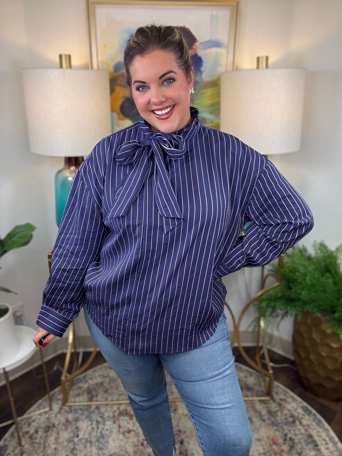 Navy pinstripe blouse with side bow tie