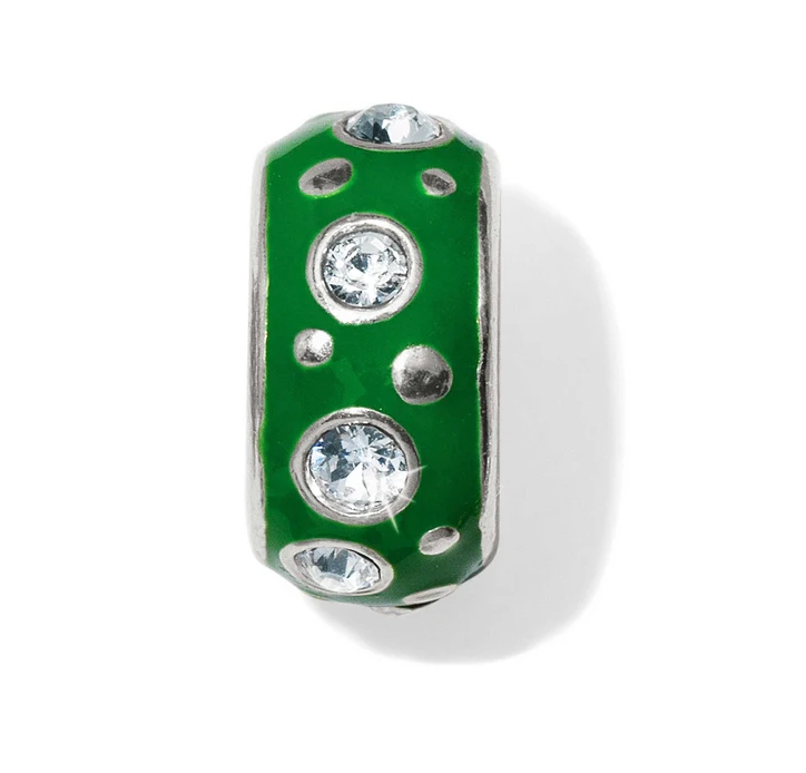 A green cylindrical charm bead with silver-toned metal edges and multiple clear rhinestones, shown on a white background with a soft shadow.