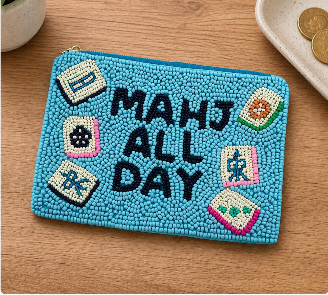 Light blue beaded pouch saying “Mahj All Day” with mahjong tile accents